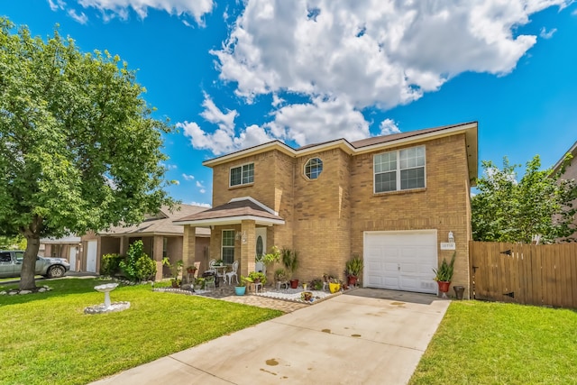 view of front of property with a front lawn and a garage