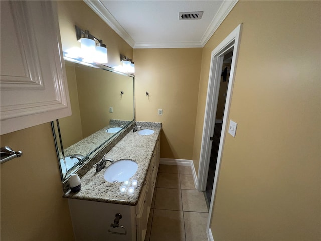 bathroom with ornamental molding, tile patterned floors, and vanity