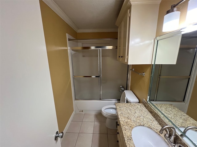 full bathroom featuring bath / shower combo with glass door, vanity, tile patterned flooring, ornamental molding, and toilet