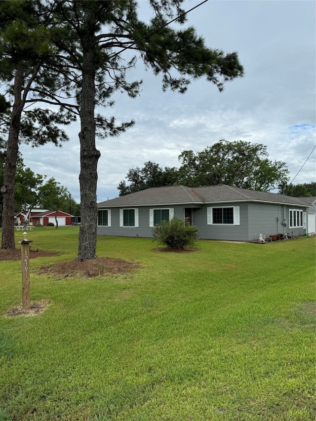 exterior space featuring a front lawn