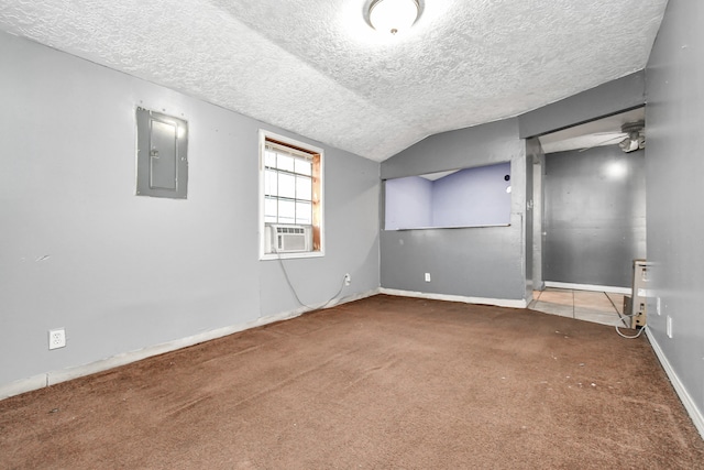 interior space with a textured ceiling, electric panel, and ceiling fan