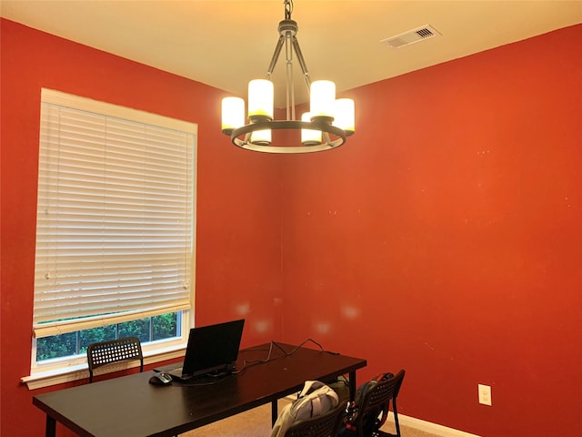 dining room featuring an inviting chandelier