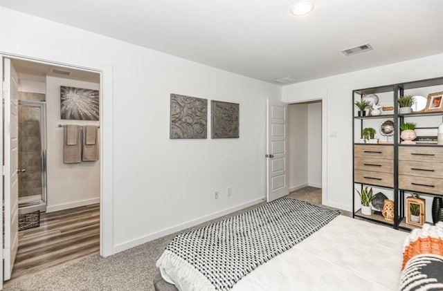 bedroom with wood-type flooring