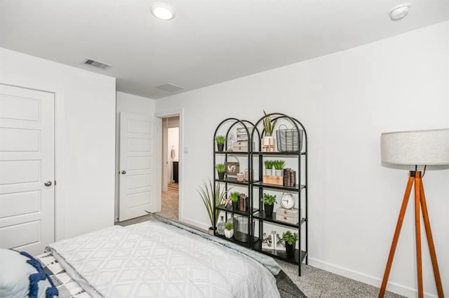 bedroom with light carpet