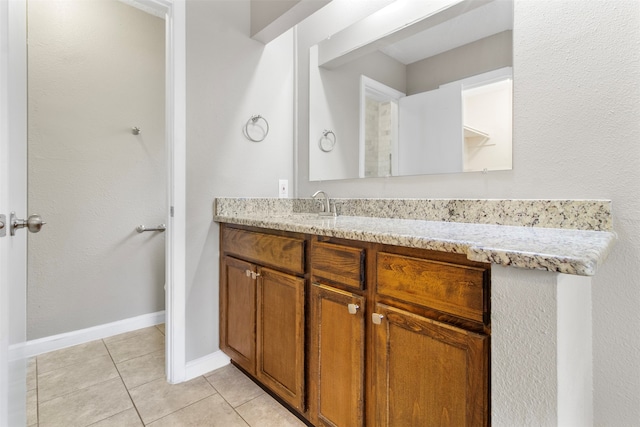 bathroom with vanity and tile patterned floors