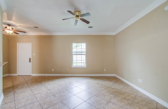 spare room featuring ceiling fan, light tile patterned floors, and crown molding