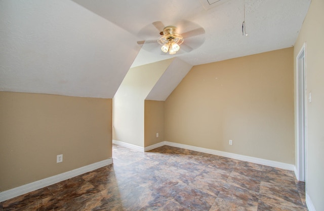 additional living space with lofted ceiling and ceiling fan