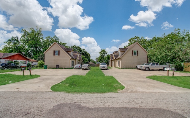 view of front of property with a front lawn