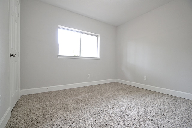 unfurnished room with carpet floors