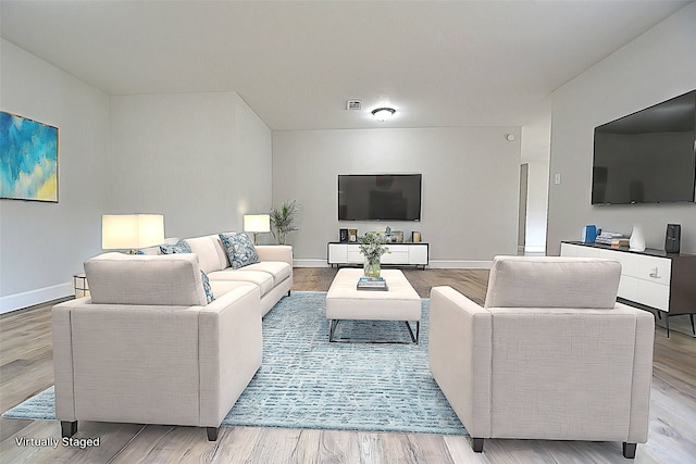 living room featuring light hardwood / wood-style floors