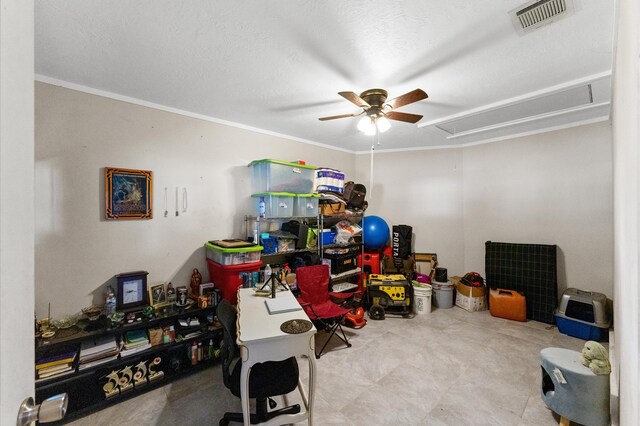 interior space with a textured ceiling, ceiling fan, and crown molding