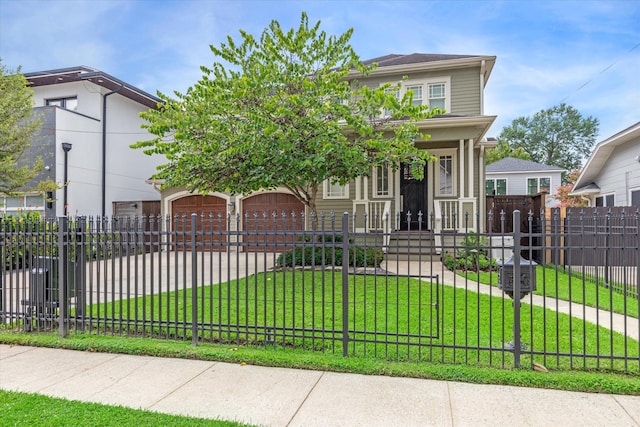 view of front of property with a garage, covered porch, and a front yard