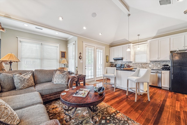 living room with lofted ceiling, ornamental molding, and dark hardwood / wood-style floors