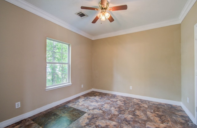 empty room featuring ceiling fan and crown molding