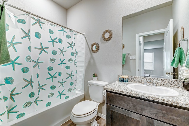 full bathroom with vanity, toilet, and shower / bath combination with curtain