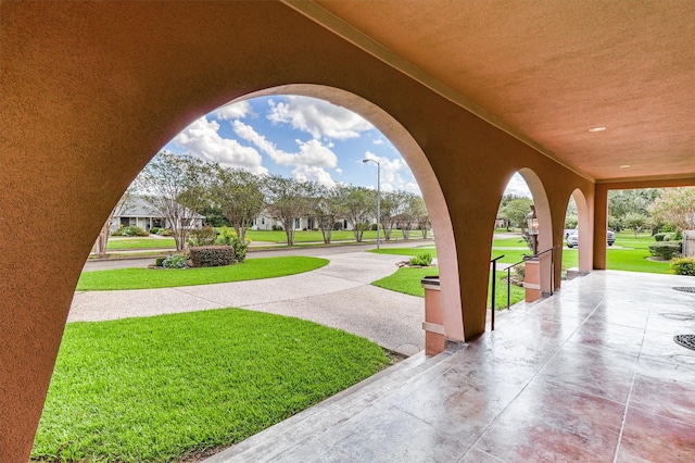 surrounding community featuring a lawn