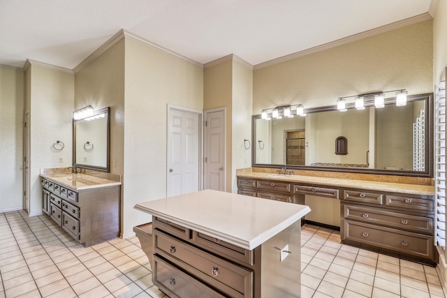 bathroom with vanity, crown molding, and tile patterned floors