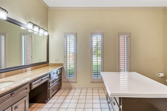 bathroom with vanity, plenty of natural light, and tile patterned flooring