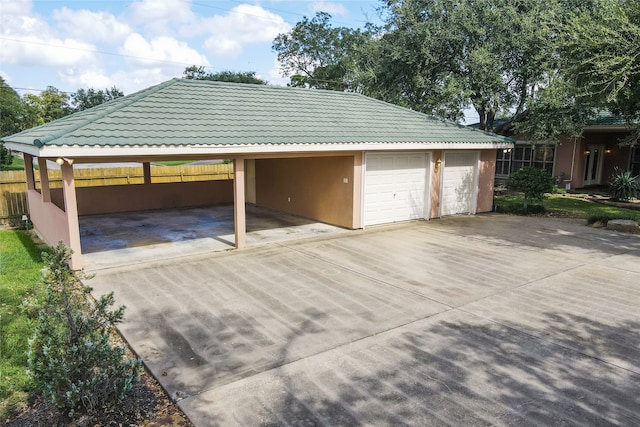 garage with a carport