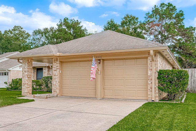 exterior space featuring a front yard and a garage