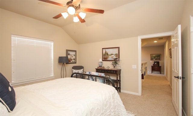 carpeted bedroom with lofted ceiling and ceiling fan