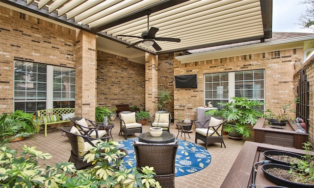 view of patio featuring ceiling fan and outdoor lounge area