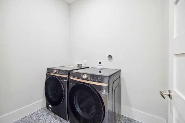 washroom featuring independent washer and dryer