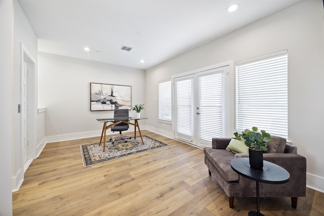 office space featuring light wood-type flooring