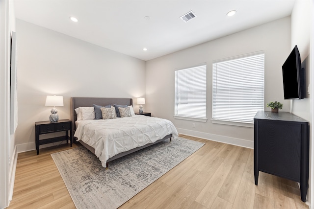 bedroom featuring light hardwood / wood-style flooring