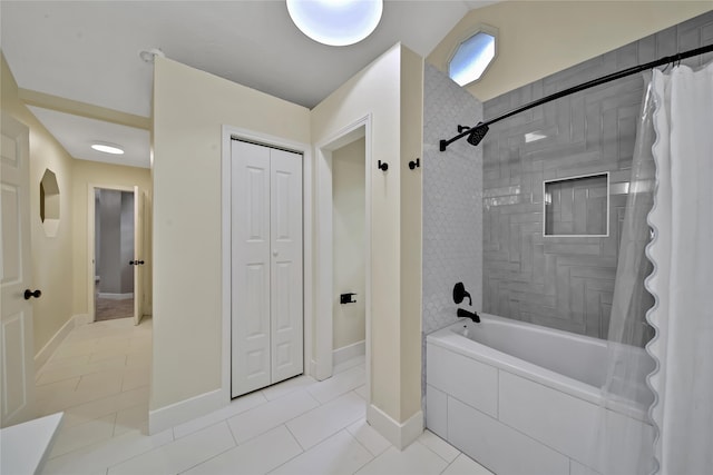 bathroom featuring shower / tub combo with curtain and tile patterned flooring