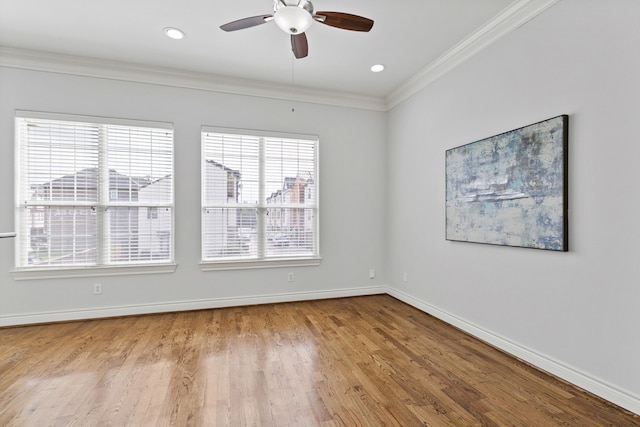 unfurnished room with ceiling fan, light hardwood / wood-style flooring, and crown molding