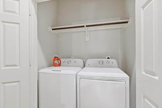 washroom featuring separate washer and dryer