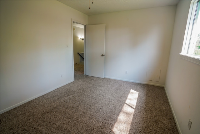 view of carpeted spare room