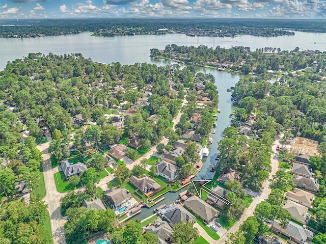 birds eye view of property featuring a water view