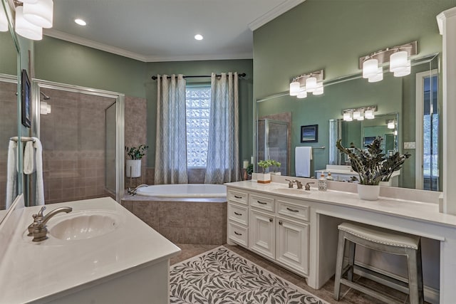 bathroom with ornamental molding, vanity, tile patterned floors, and independent shower and bath