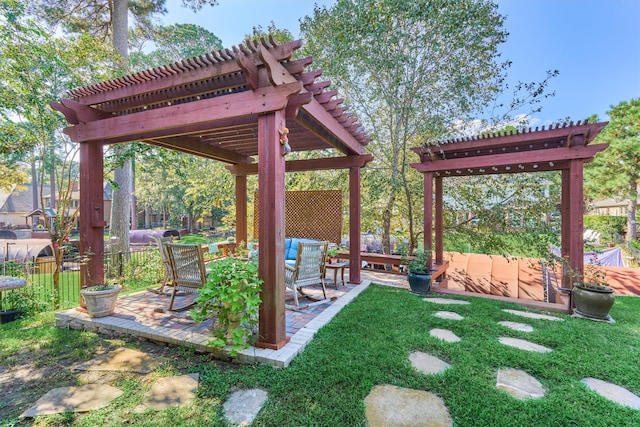 view of yard with a pergola and a patio