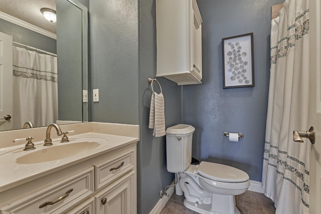 bathroom with tile patterned flooring, vanity, toilet, and crown molding