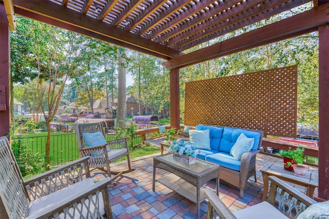 view of patio / terrace featuring a pergola and an outdoor hangout area