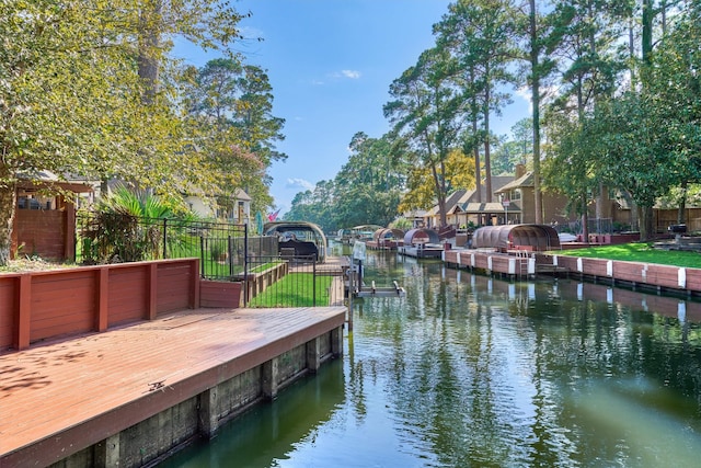 dock area featuring a water view