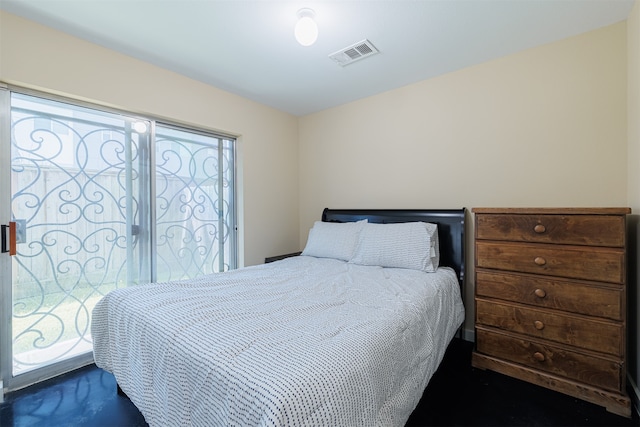 bedroom featuring dark colored carpet