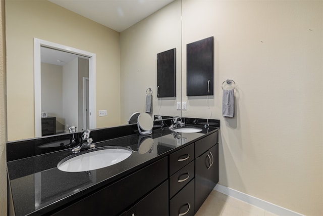 bathroom featuring vanity and tile patterned floors