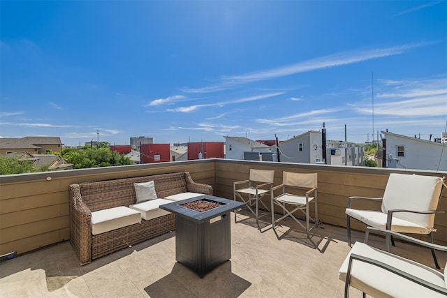 view of patio / terrace featuring a fire pit