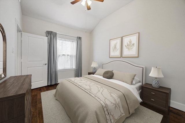 bedroom featuring vaulted ceiling, ceiling fan, and dark wood-type flooring