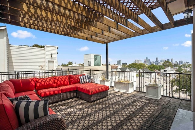 view of patio / terrace with a pergola and an outdoor living space