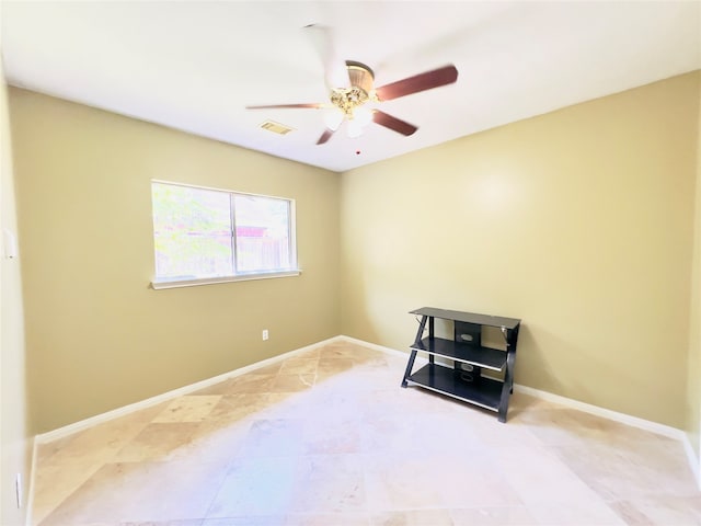 unfurnished room with ceiling fan