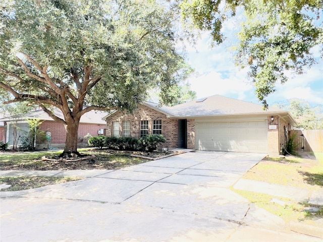 single story home featuring a garage