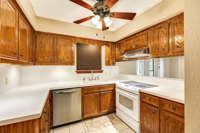 kitchen with dishwasher, light tile patterned flooring, sink, white electric stove, and ceiling fan