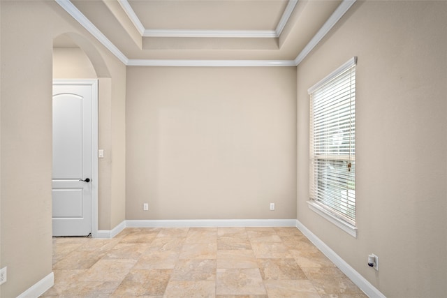 spare room featuring crown molding