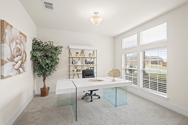 view of carpeted office space