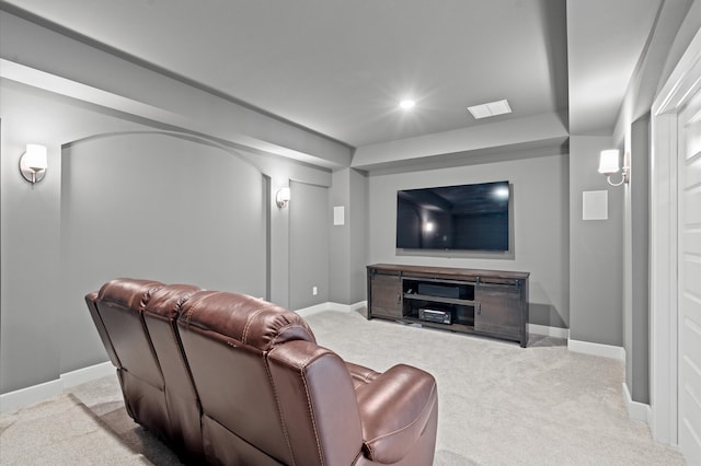 home theater featuring light colored carpet